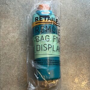 New still in package Owala kid Blue and Orange Water Bottle. 16oz.